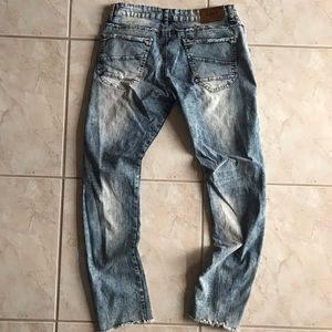 Raw X distressed denim